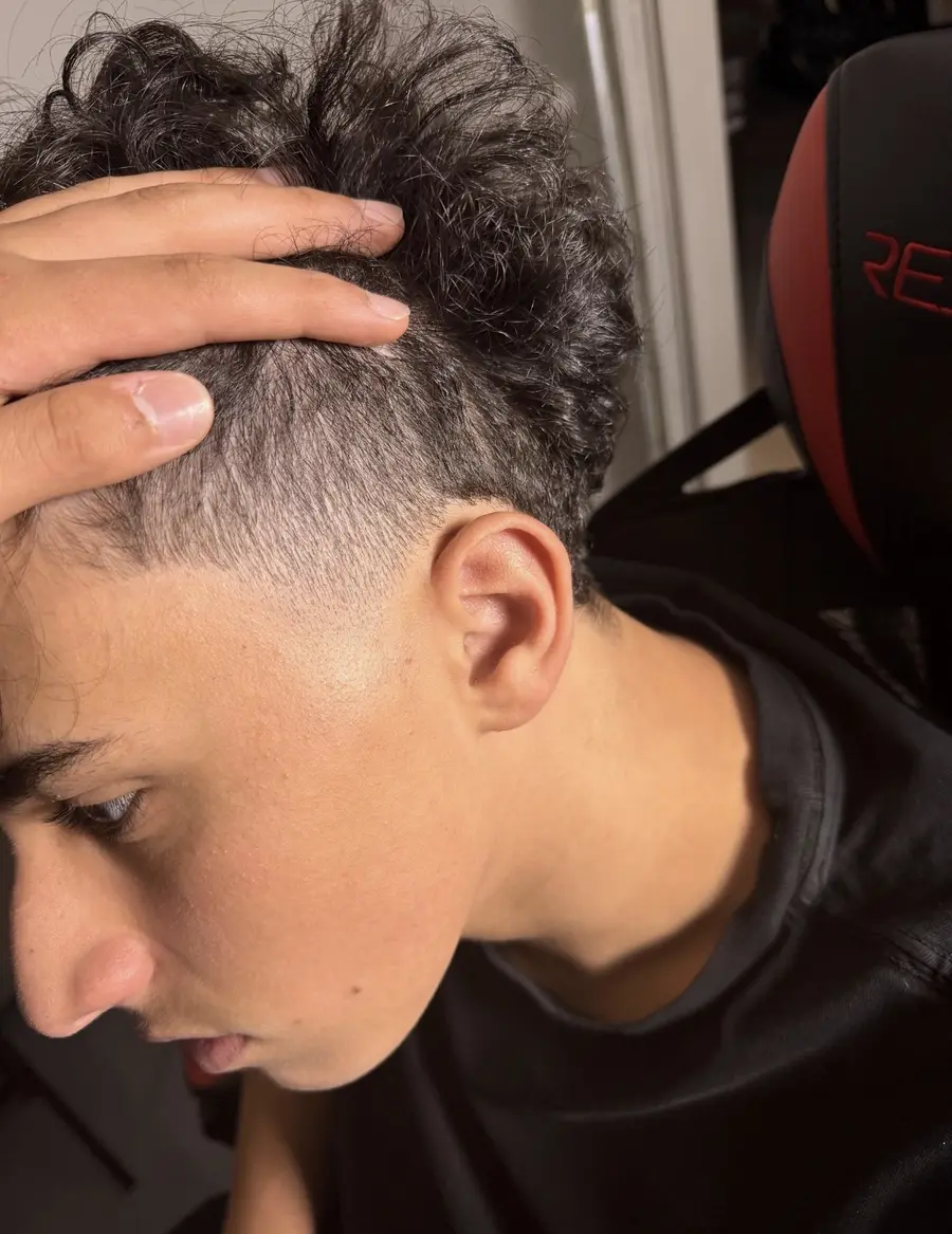 Side profile showing a finished taper and textured top